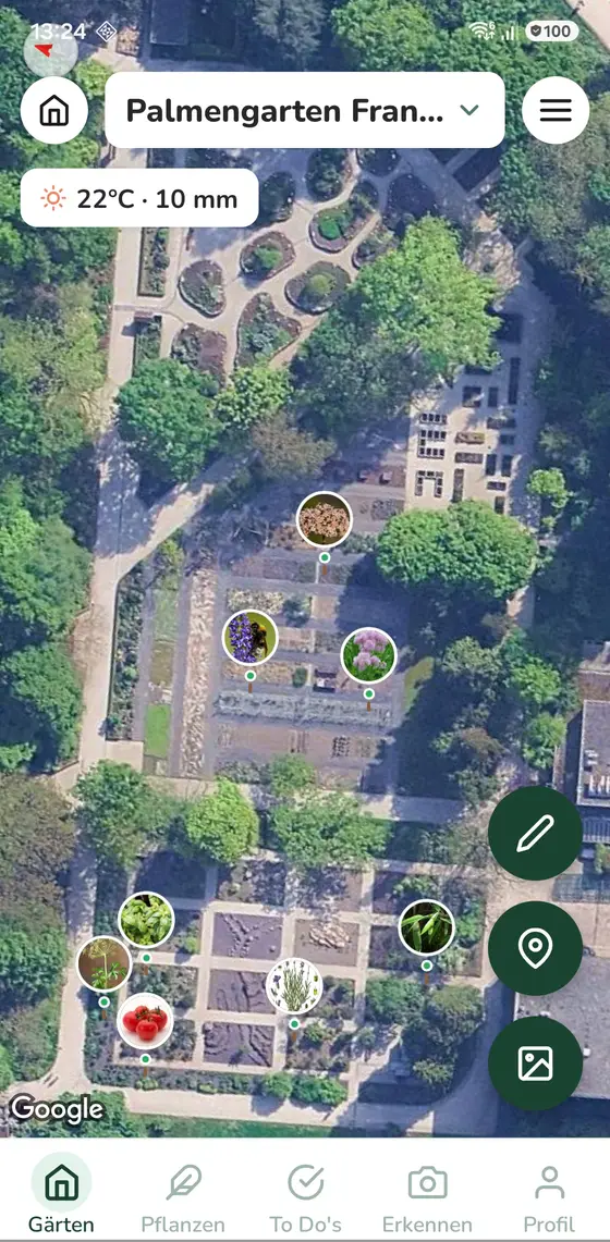 Snipbud-App: Satellitenansicht eines Gartens, in dem einzelne Pflanzen als Marker mit Pflanzenfoto an ihrer tatsächlichen Position eingezeichnet sind.